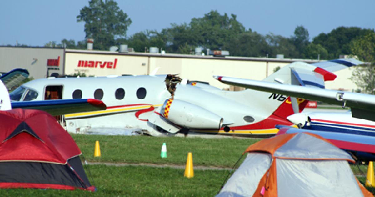 A Hawker Beechcraft Premier I carrying Roush Fenway Racing co-owner Jack Roush and a friend crashed while landing at EAA Airventure in Oshkosh, Wis., at about 6:30 p.m. on Tuesday. 