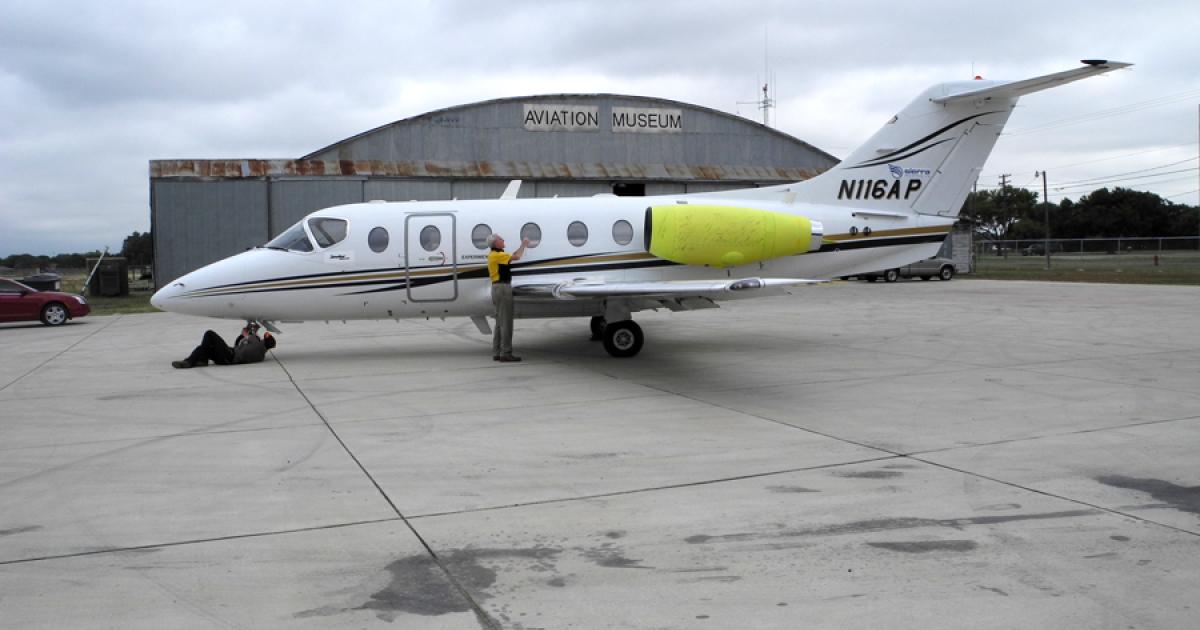 The Hawker 400XPR made its first flight with its new Williams International FJ44-4A-32 turbofans today, taking off from Garner Field Airport in Uvalde, Texas. Sierra Industries of Uvalde did the re-engining work on the twinjet. (Photo: Matt Thurber)