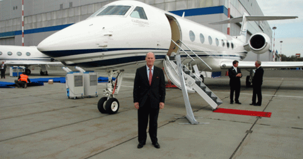 Gulfstream president Larry Flynn, standing in the foreground of a G550, is one of the few Western aircraft manufacturer chiefs attending Jet Expo 2012 in Moscow. He told AIN at the show that Russia is an important market for Gulfstream, hence the reason he decided to go to the show. (Photo: Vladimir Karnozov)