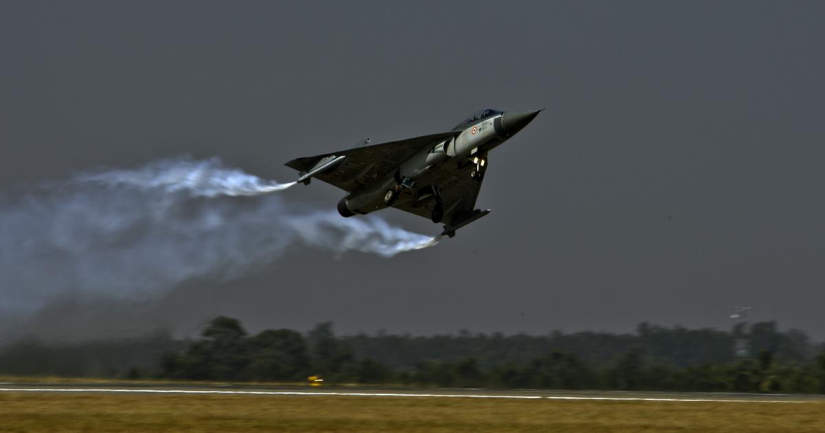 Indian defense minister AK Antony has expressed his impatience over long delays to HAL's Light Combat Aircraft program. {Photo: Pradip Dasgupta, Indian MoD]].