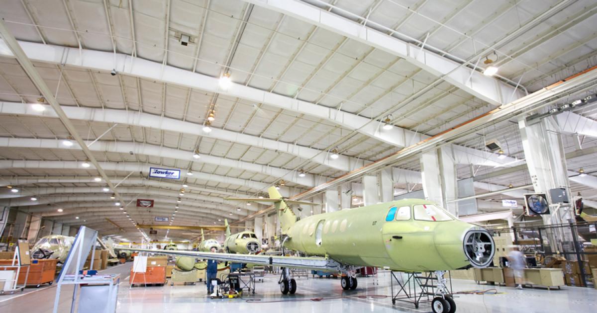 Despite filing Chapter 11 bankruptcy today, Hawker Beechcraft will continue normal operations, meaning its aircraft production lines–such as this one for the Hawker 900XP–will continue to flow.