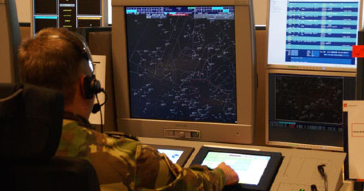 A military controller at the Nieuw Milligen Air Operations Control Station tracks flights with data provided by Eurocontrol’s Maastricht Upper Area Control Center. (Photo: Royal Netherlands Air Force) 