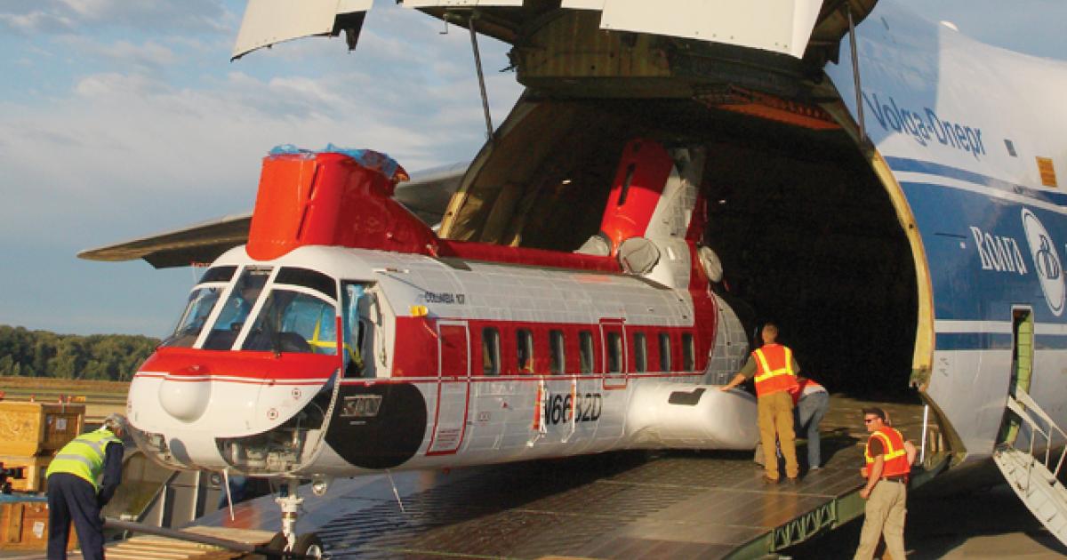 A Boeing Vertol is loaded into an Antonov An-124 by Panalpina Heliship.