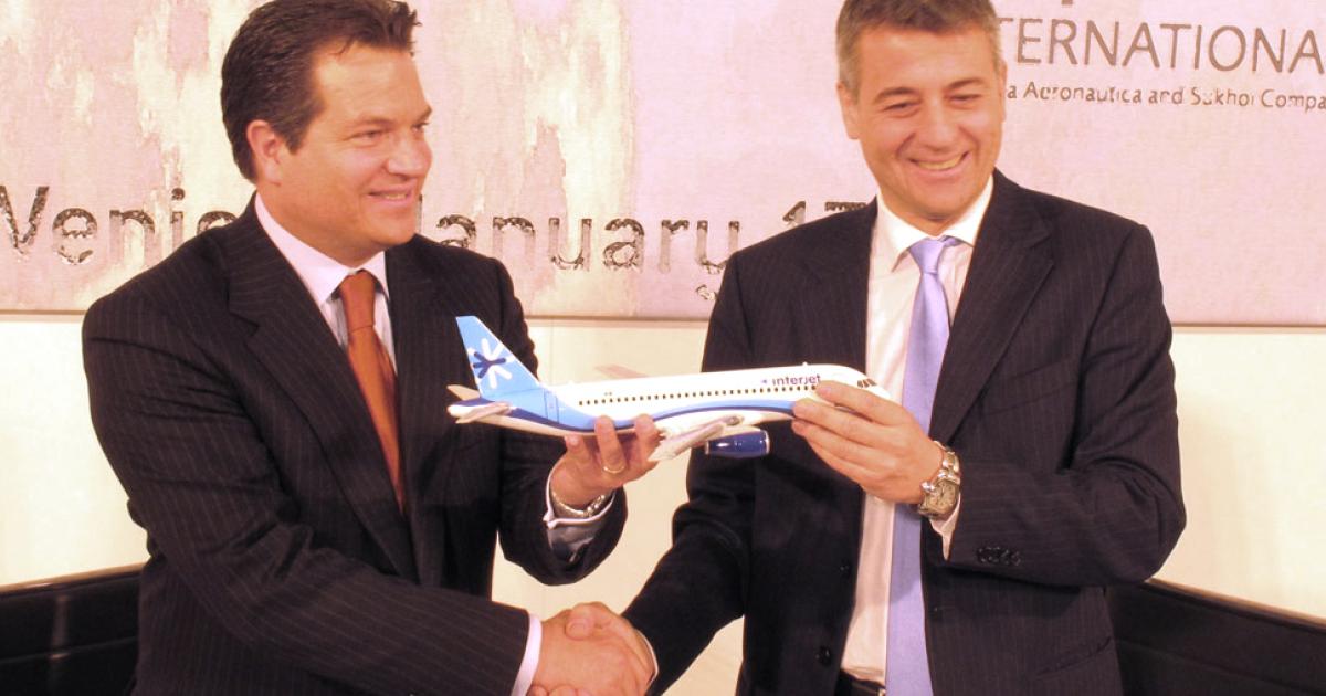 The Sukhoi Superjet 100 lands at Farnborough Airport.