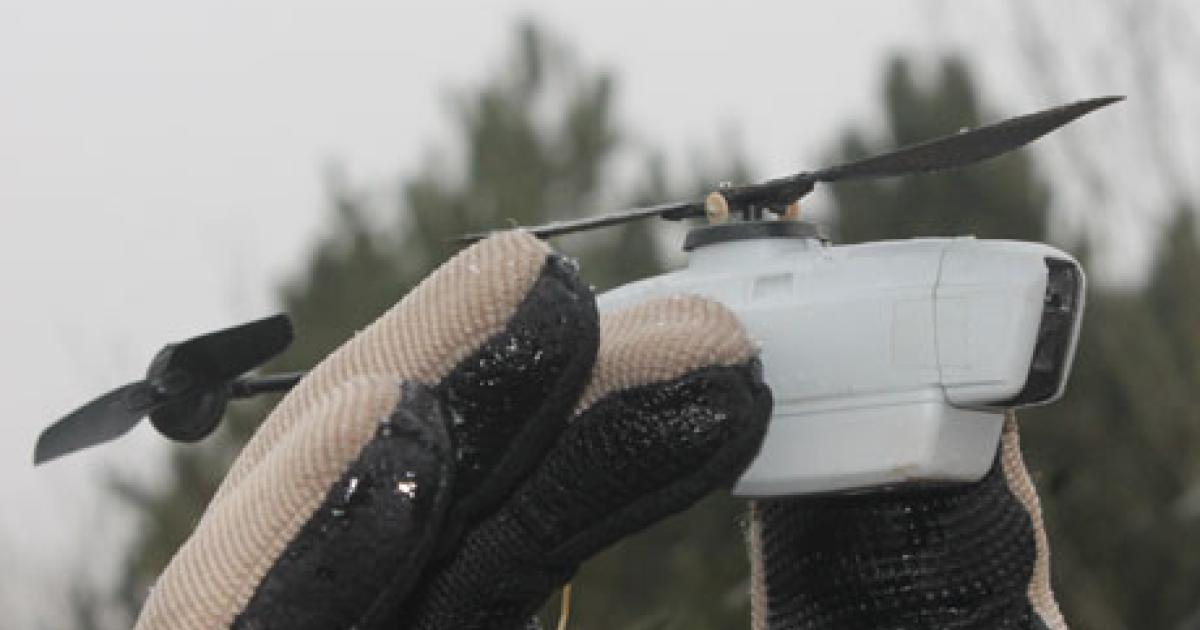 The British Army demonstrated its “nanocopter,” also known as the Black Hornet micro-UAV, on Salisbury Plain last week. (Photo: Chris Pocock)