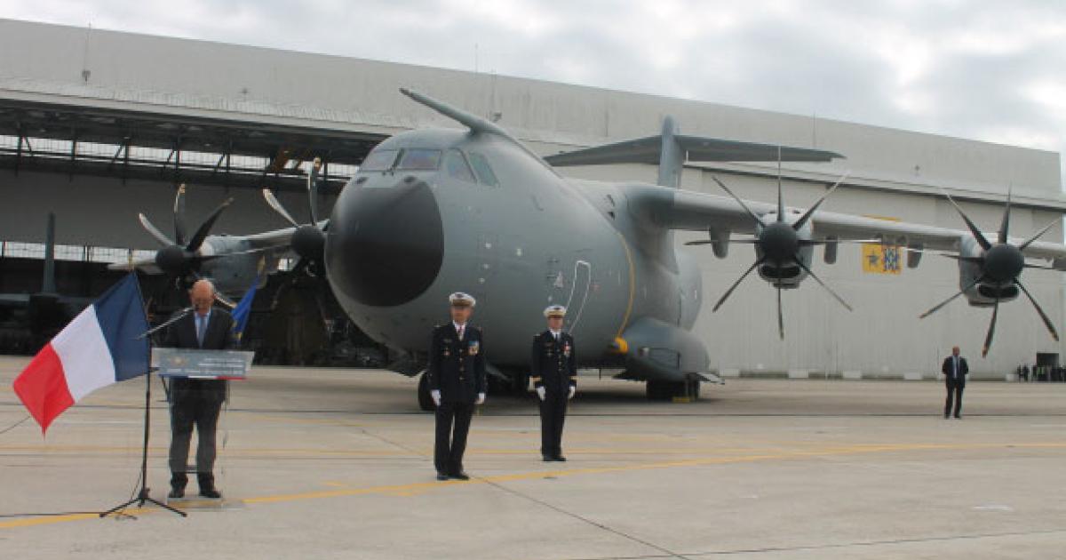 French Defence Minister Jean-Yves Le Drian formally welcomes the first French Air Force A400M at Orleans airbase. (Photo: Chris Pocock)