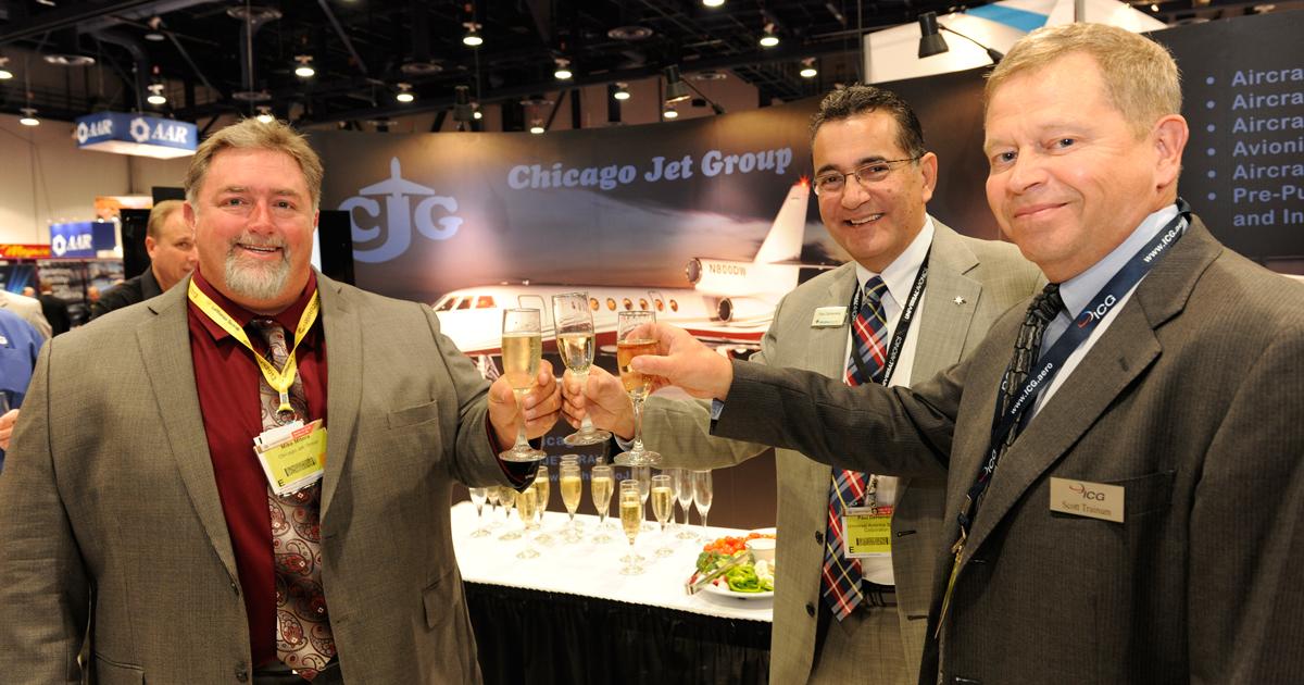 l-r: Mike Mitera, Chicago Jet Group director of operations, Paul DeHerrera, CEO of Universal Avionics, L. Scott Trainum, CEO of ICG
