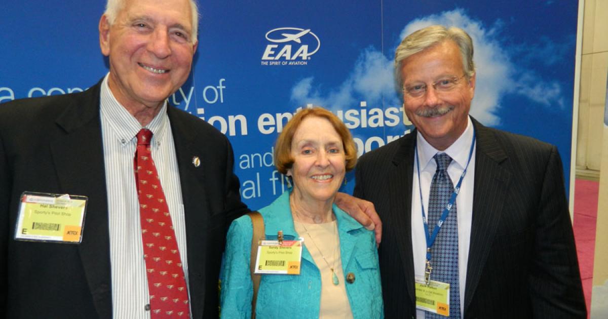 Hal Shevers (left), Sporty’s Pilot Shop founder and chairman, and his wife Sandy Shevers dropped by EAA’s NBAA booth to talk aviation with Jack Pelton, EAA chairman and acting president.