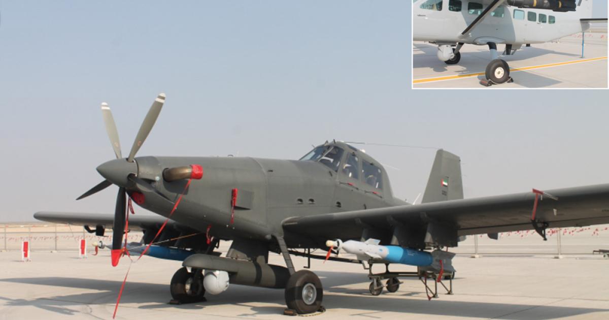 The Air Tractor AT-802i operated by the UAE Special Operations Command made its public debut at the Dubai Airshow. Also shown (inset) was a Cessna AC-208 Caravan armed with Hellfire missiles. (Photos: Chris Pocock) 
