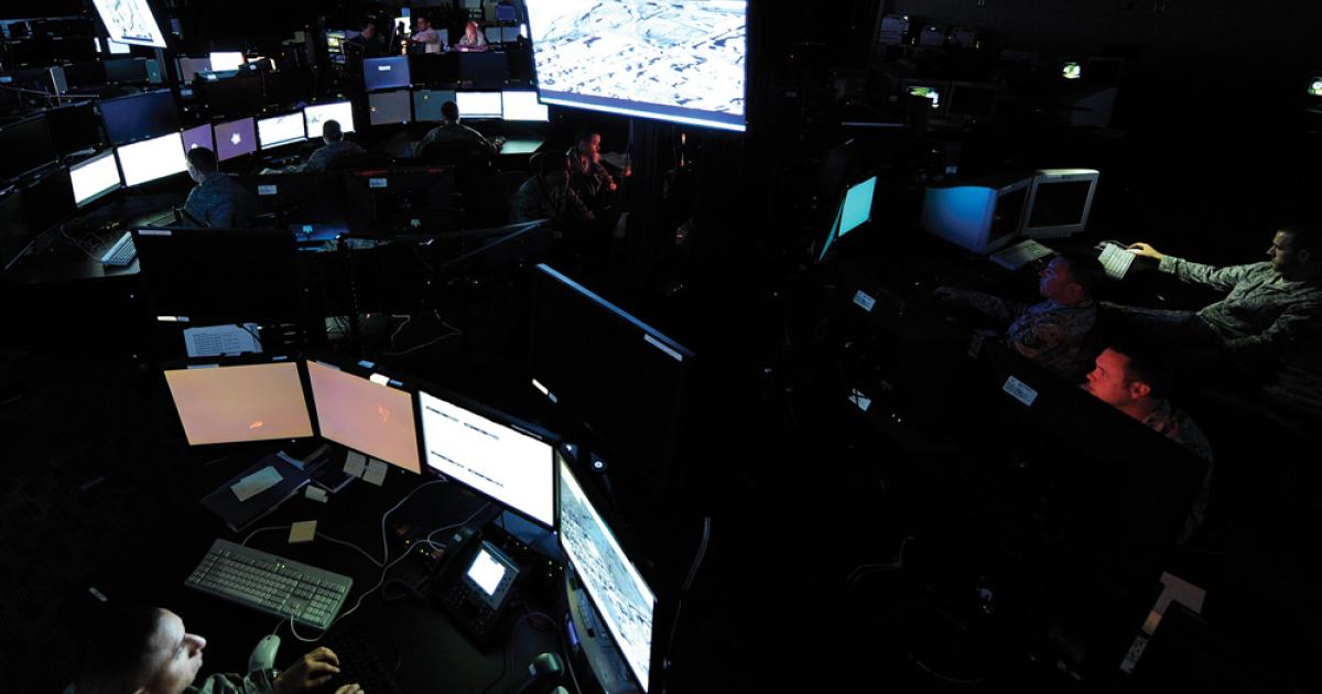 Intelligence analysts at work in one of the U.S. Air Force’s Distributed Common Ground System (DCGS) locations. Lockheed Martin is leveraging the millions of dollars invested in the DCGS to offer ISR systems for export.