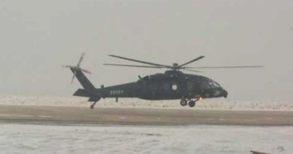 The Z-20 gets air under its wheels for the first time at a snowy location in China, almost certainly at the Harbin factory. (Photo via Chinese internet)  