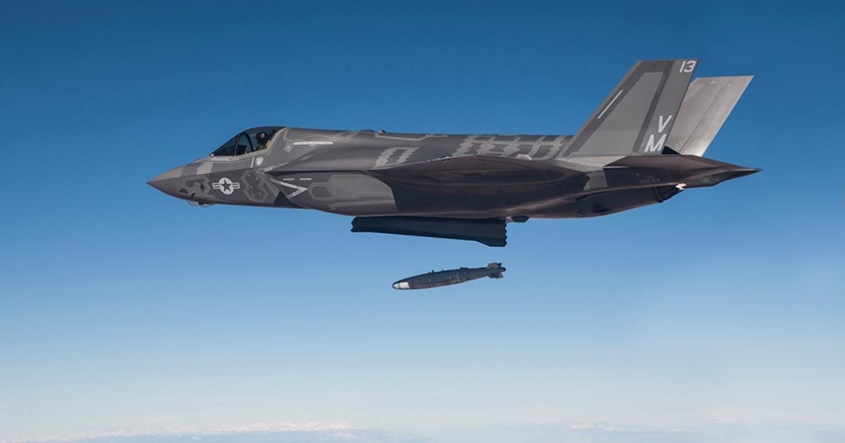 An F-35B drops a GBU-32 guided munition during a live-fire weapons delivery test at Edwards Air Force Base, Calif. (Photo: U.S. Navy) 