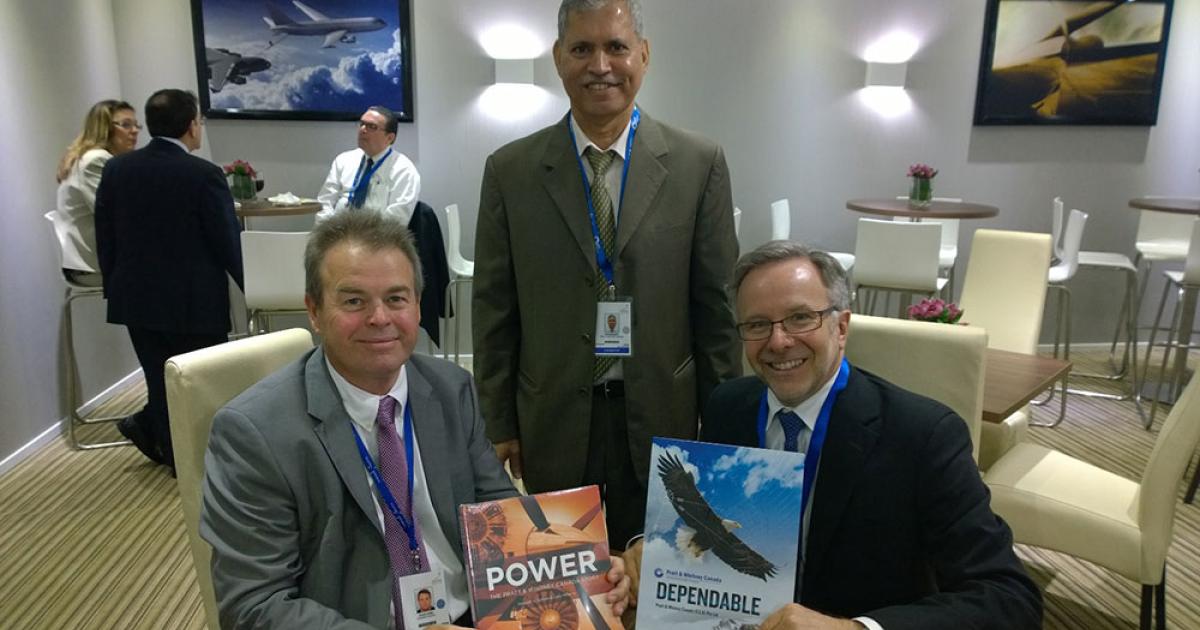 Doug Park, Hawker Pacific Aerospace v-p; Sugrim Misir, senior regional sales manager, P&WC (SEA); and Richard Dussault, P&WC v-p of marketing, signed a memorandum of understanding under which the FBO could become the first in the region to provide repair services for P&WC’s engine diagnostics, prognostics and health management products.