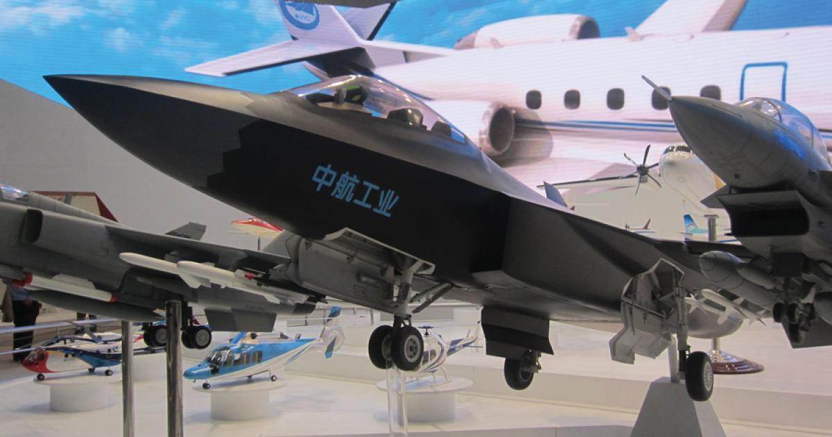 AVIC’s display at the Aviation Expo China show included this scale model of the company’s J-31/Project 310. It’s designed to be marketed as China’s stealthy export competitor to Lockheed’s F-35.