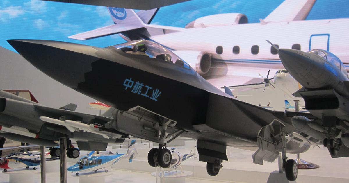 AVIC’s display at the Aviation Expo China show included this scale model of the company’s J-31/Project 310. It’s designed to be marketed as China’s stealthy export competitor to Lockheed’s F-35. 