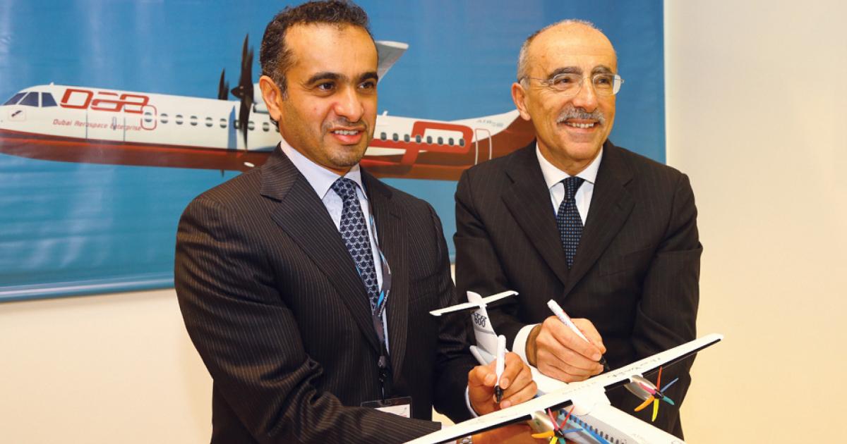 Dubai Aerospace Enterprise managing director Khalifa Al Daboos (left) with ATR chief executive Filippo Bagnato. (Photo: Mark Wagner)