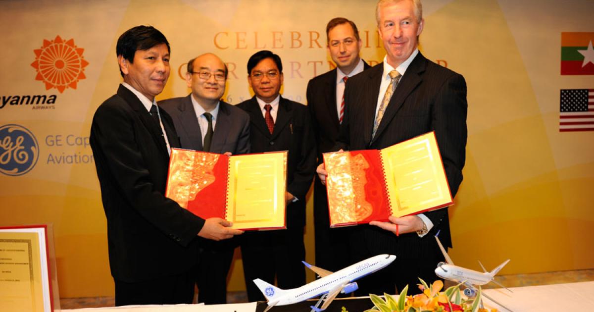 Sealing the deal for 10 Boeing 737s aircraft yesterday in Singapore were (left to right): Myanma Airways managing director Capt. Than Tun, Gecas president and CEO Norman Liu, Myanmar transport minister HE Nyan Htun Aung, U.S. Ambassador to Myanmar Derek Mitchell and Gecas executive v-p marketing Mike Jones.