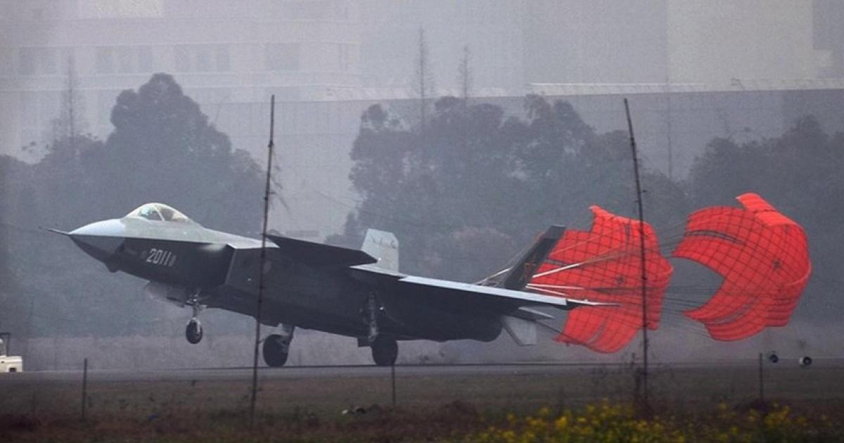 J-20 No. 2011 streams its twin brake chutes during high-speed taxi tests at Chengdu. (Chinese Internet) 