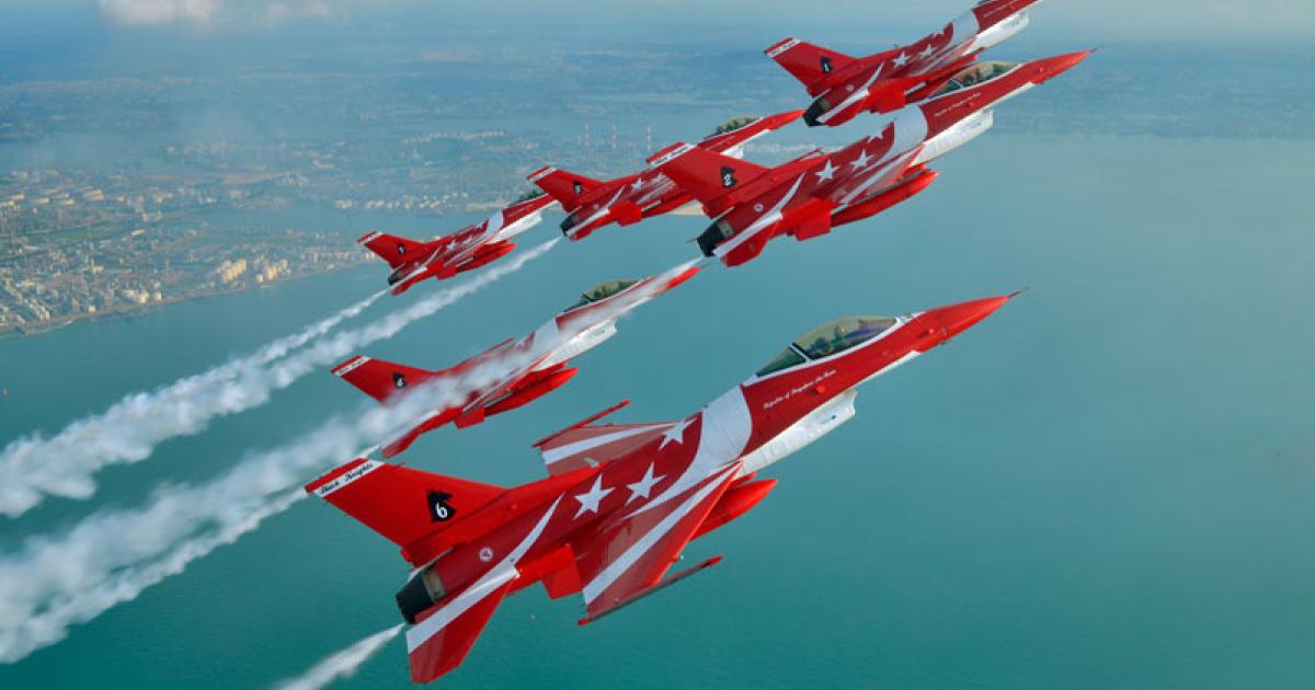 The Republic of Singapore Air Force (RSAF) reformed its Black Knights aerobatic team to perform daily at the Singapore Airshow. (Photo: MINDEF Singapore/K. Tokunaga)