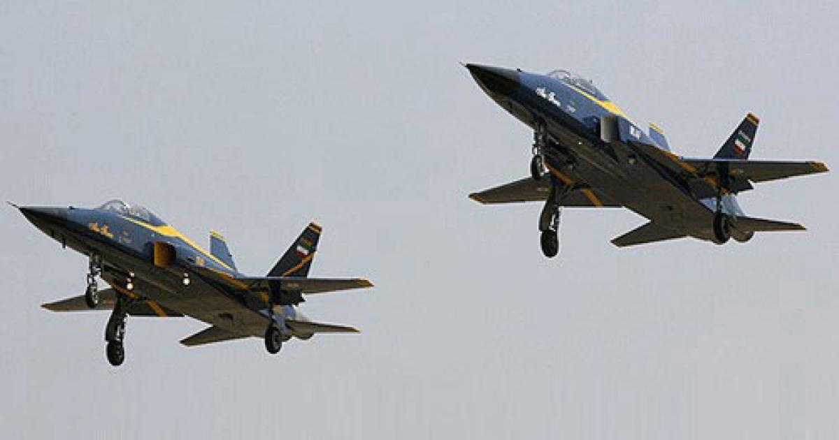 Iran’s Saeqeh fighters wear a ‘Blue Angels’-style paint scheme. These two aircraft exhibit different styles of air intake.