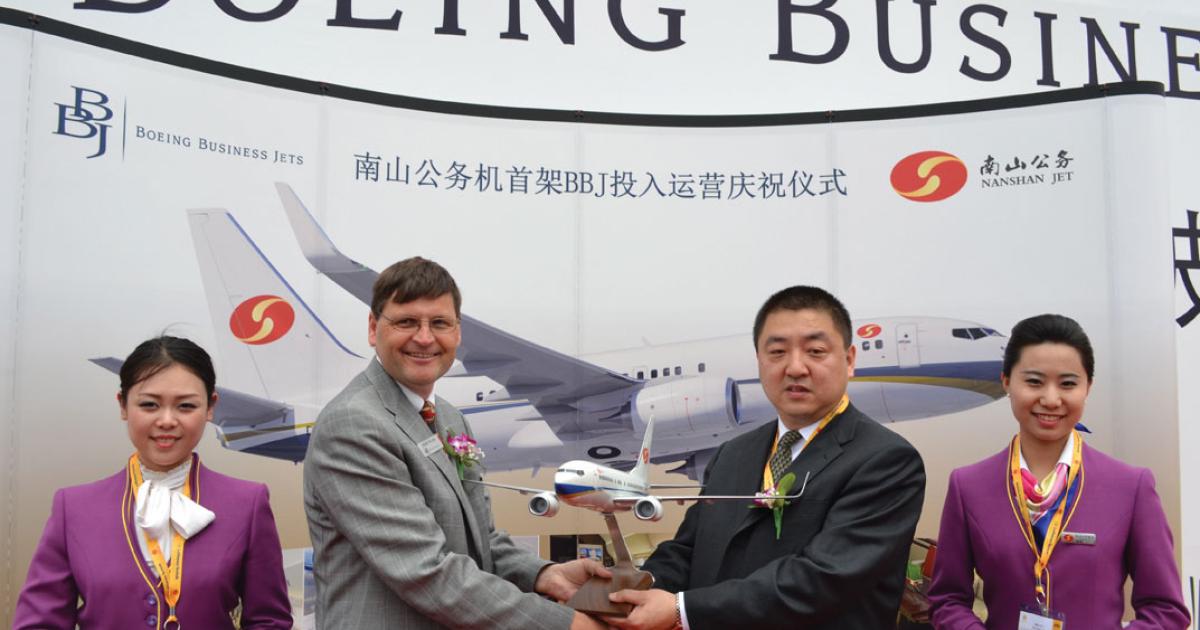 Last year at ABACE 2013 Steve Taylor, BBJ president, presented a model of Nanshan Jet’s BBJ to Yu Bin, chairman of Nanshan Aviation Development Co.