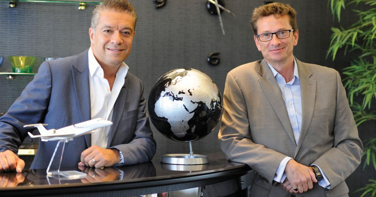 George Galanopoulos, left, and Patrick Margetson-Rushmore started London Executive Aviation in 1996. Here they are pictured at the company’s Stapleford base near London, where they opened a new executive lounge.
