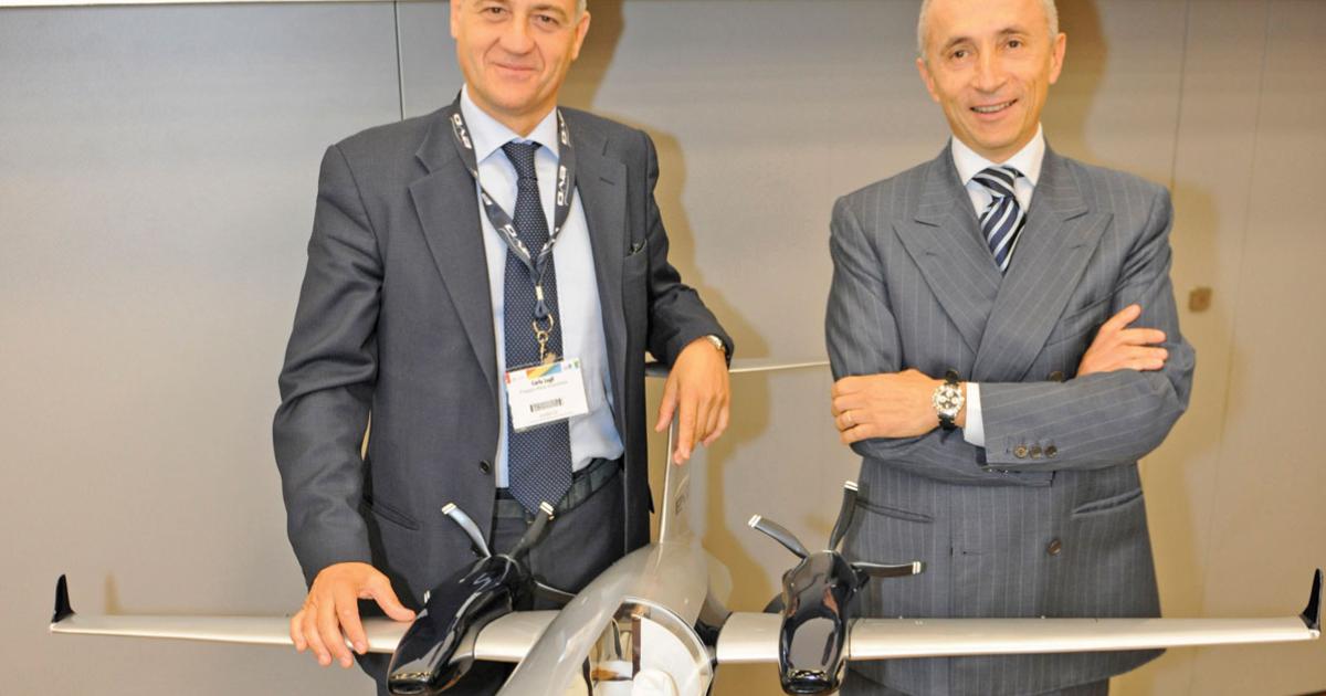 Piaggio CEO Carlo Logli, left, and chairman Alberto Galassi.