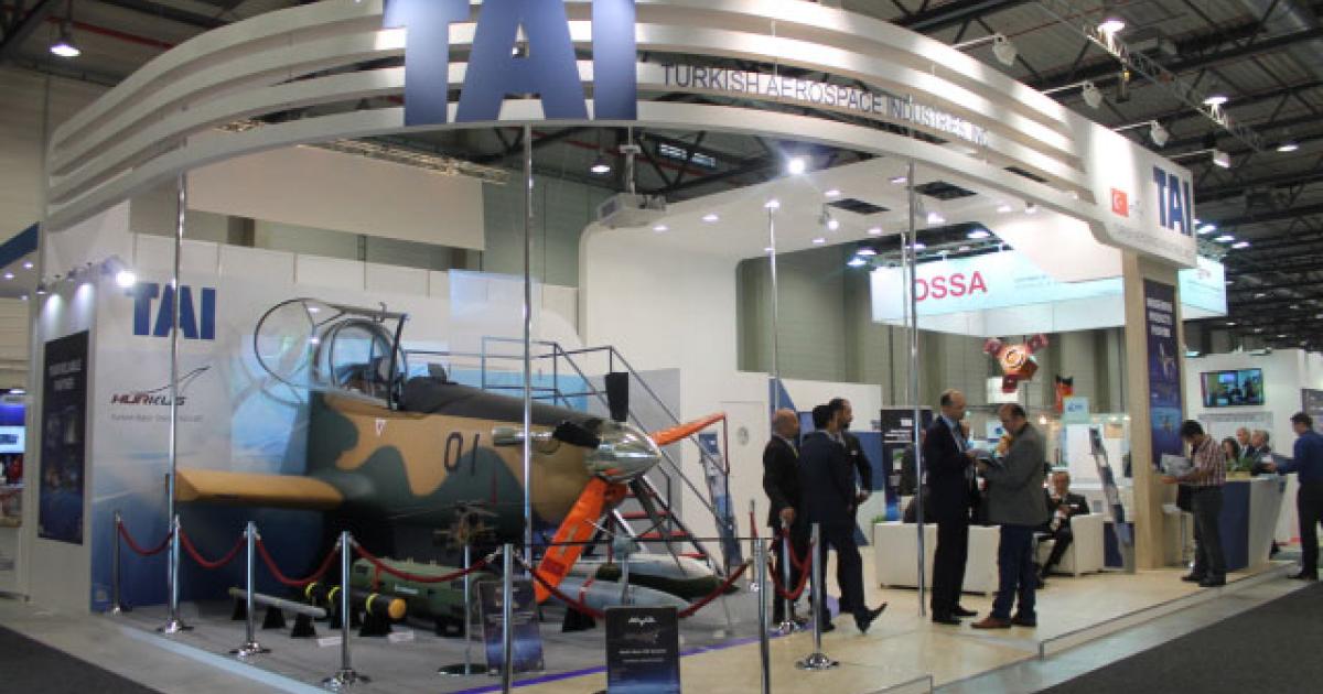 Turkey’s aerospace industry was a big exhibitor at the ILA Berlin Airshow, including Turkish Aerospace Industries (TAI), whose stand included a Hurkus turboprop trainer cockpit and nose section. (Photo: Chris Pocock)