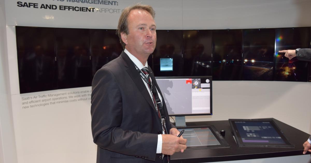  Per Ahl, Saab vice president of air traffic management, explains the company's remote tower system during the Farnborough Airshow. (Photo: Bill Carey)
