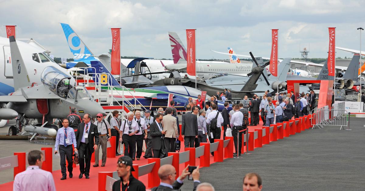 There was plenty of defense news at the Farnborough International airshow. This is a view of the Finmeccanica display area, where the company announced new orders for various AgustaWestland helicopters. (Photo: Mark Wagner)
