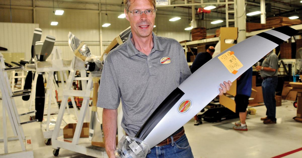 Hartzell group president Joe Brown represents the second generation of management since his Naval aviator father, Jim, bought the company from TRW in 1987. He is holding a high-tech composite blade that propels not only a TBM850/900 but also the rising fortunes of all turboprop builders.