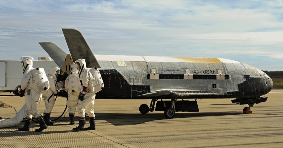A recovery team meets the Orbital Test Vehicle at Vandenberg Air Force Base. (Photo: Boeing)