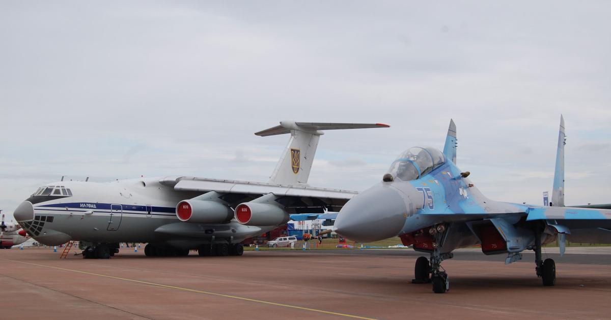 The Ukrainian air force has lost a number of aircraft to ground fire during the conflict with separatist forces in the southeast of the country. They include an Il-76 transport, seen here with one of the country’s Su-27 interceptors. (Photo: Chris Pocock)  