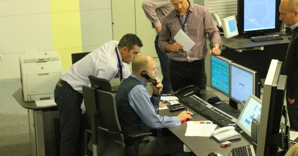 Air traffic controllers are shown at work in the Sarajevo control center after operations started in November. (Photo: BHANSA)