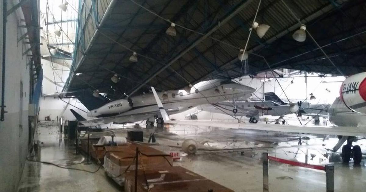 A hangar roof at São Paulo Congonhas Airport collapsed on Thursday during a summer storm, damaging a Challenger 300 and crushing a King Air. The Challenger, registered as PR-YOU and shown here, is a 2014 model that was delivered to the customer just seven months ago.