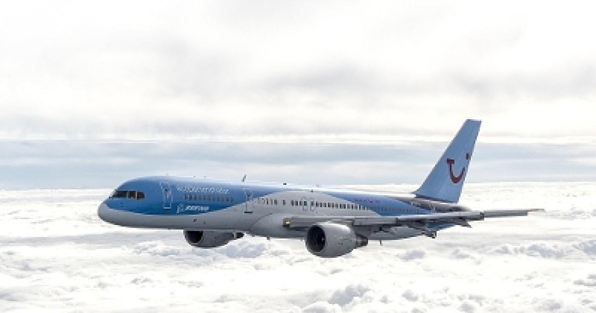 Painted in the colors of program collaborator TUI Group, the Boeing 757 ecoDemonstrator will fly for several months before recycling. (Photo: Boeing)