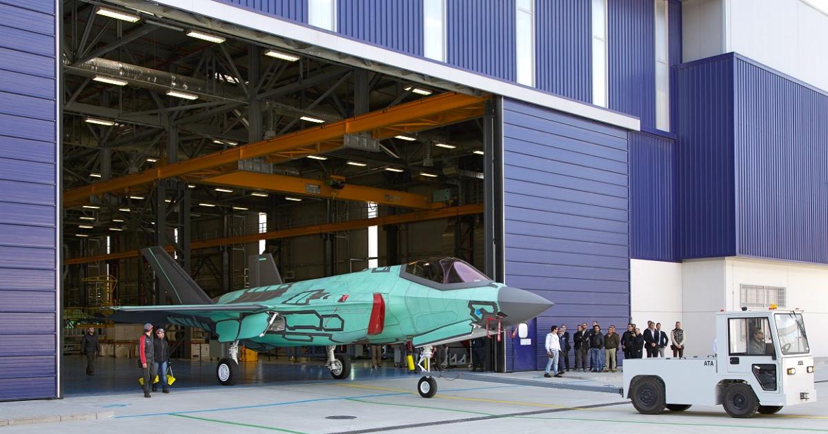 AL-1, the first of eight F-35As assembled for the Italian air force, rolls out of the Cameri FACO in Italy. (Photo: Lockheed Martin)