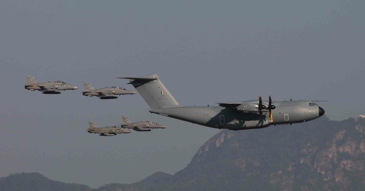 Malaysia’s first A400M was handed over for a second time at  the LIMA show and flew in formation with four RMAF Hawk 200s. (Photo: Chris Pocock)