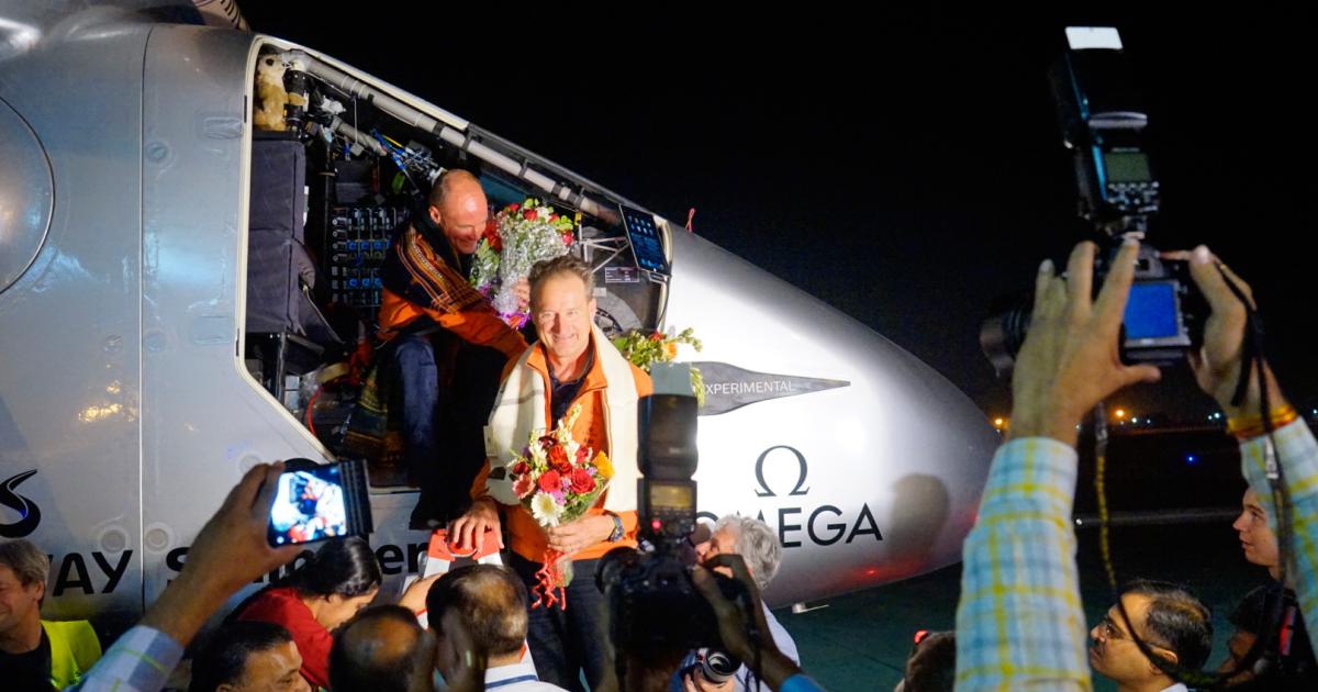 Solar Impulse pilot André Borschberg welcomes his colleague Bertrand Piccard in Ahmedabad, India. 