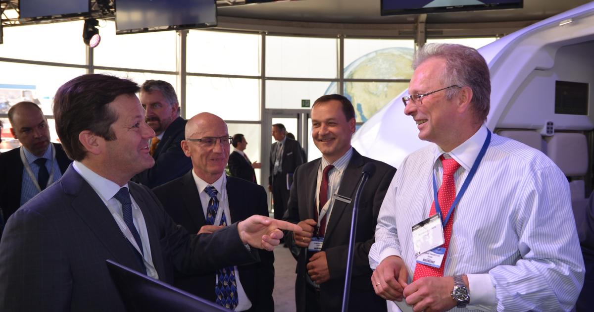 Bombardier chairman Pierre Beaudoin (left) meets with IFC director general Alexander Roubtsov at the 2013 Paris Air Show. (Photo: Vladimir Karnozov)