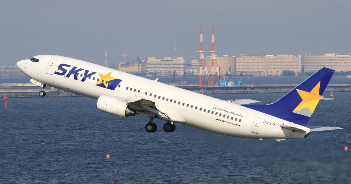 A Skymark Boeing 737-800 takes off from Tokyo International Airport. (Photo: Flickr: <a href="http://creativecommons.org/licenses/by-sa/2.0/" target="_blank">Creative Commons (BY-SA)</a> by <a href="http://flickr.com/people/fireballsg72" target="_blank">Ken H / @chippyho</a>)