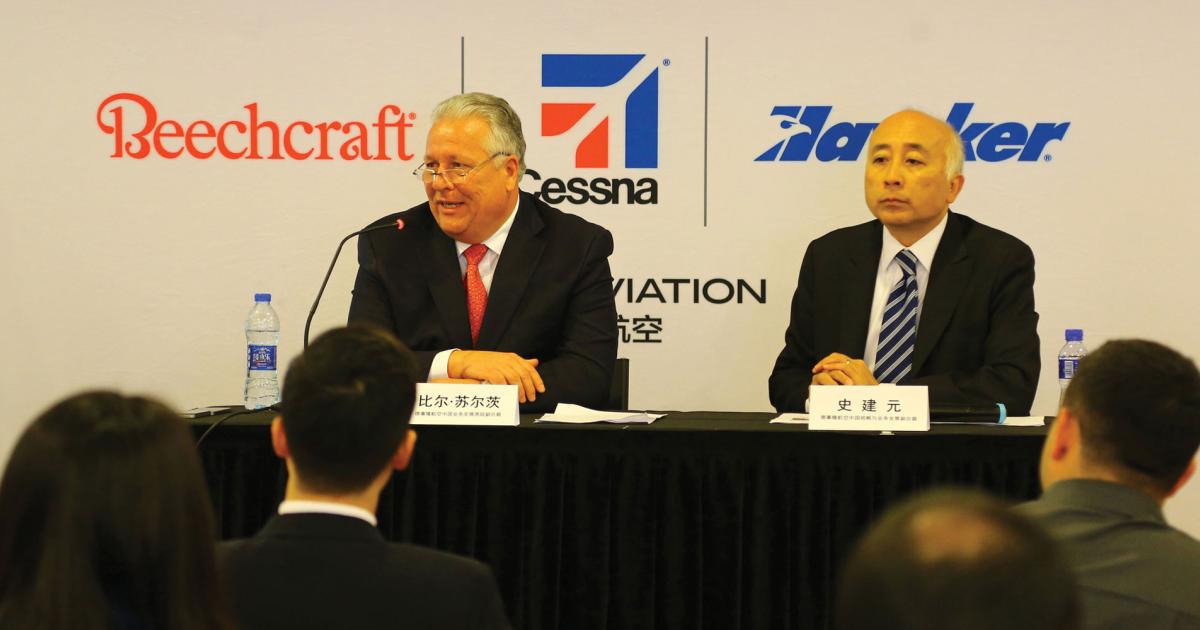 Textron Aviation’s Bill Schultz (left), senior v-p of business development for China and Mike Shih, v-p of strategy and business development for China, discussed expansion plans at yesterday’s ABACE 2015 press conference. (Photo: David McIntosh)
