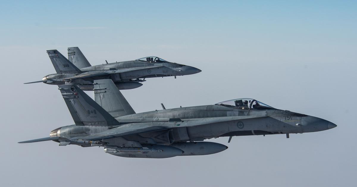 Canadian CF-18A Hornets are now flying over Syria. Six of the 12 countries participating in Operation Inherent Resolve have not yet agreed to extend their offensive action from over Iraq to over Syria. (Photo: Canadian Armed Forces).
