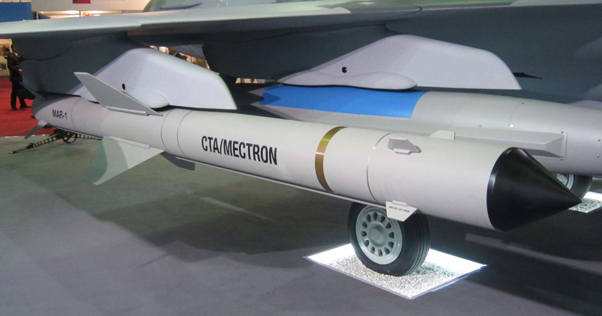The Mectron MAR-1 is an air-surface anti-radiation missile that is being developed in Brazil. It was shown underneath a full-scale model of the Saab Gripen, at the recent LAAD show. (Photo: Reuben Johnson)
