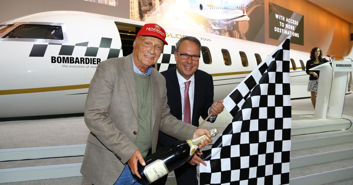 Three-time Formula 1 champion Niki Lauda placed an order for a Global 7000 on Sunday at EBACE. Celebrating the deal are Lauda and Bombardier Business Aircraft senior vice president of sales Peter Likoray. Photo: David McIntosh