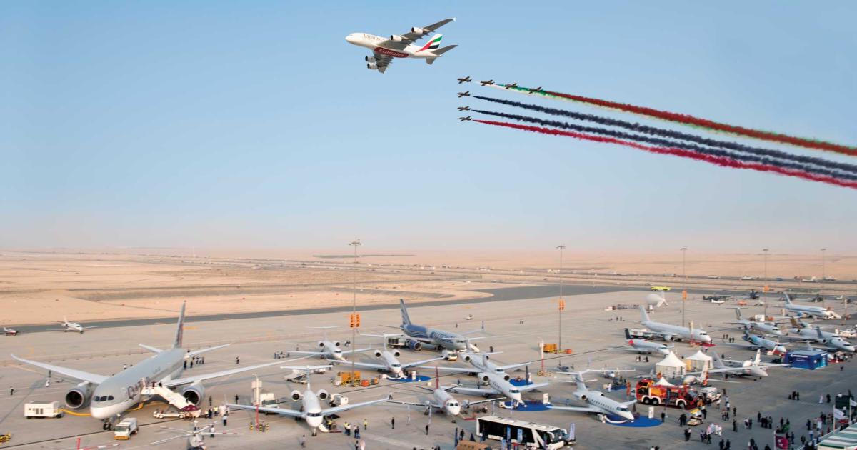 The national colors fly high over the Dubai Airshow, in the livery of an Emirates A380 and the smoke trails of the Al Fursan (Knights) jet demonstration team.