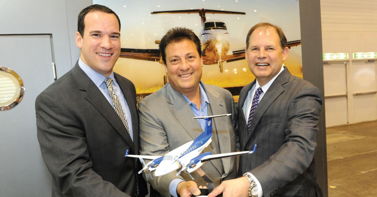 Textron Aviation King Air business leader Patrick Buckles, Wheels Up founder and CEO Kenny Dichter and Textron Aviation president and CEO Scott Ernest celebrate Wheels Up’s conversion of 35 options for King Air 350is to firm orders.