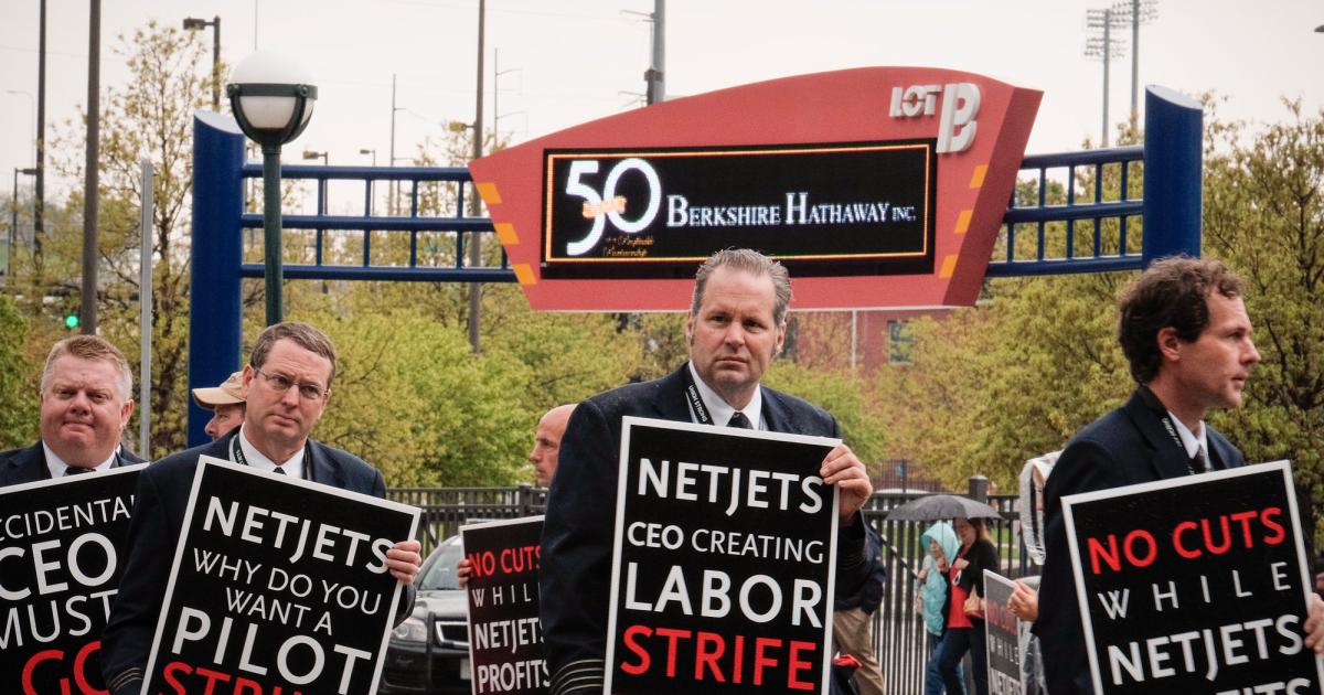 Hundreds of NetJets pilots, respresented by the NetJets Association of Shared Aircraft Pilots (NJASAP), picketed in front of Omaha’s CenturyLink Center on May 2 during the annual shareholders meeting of parent company Berkshire Hathaway. They are protesting labor strife and extended contract negotiations. (Photo: NJASAP)