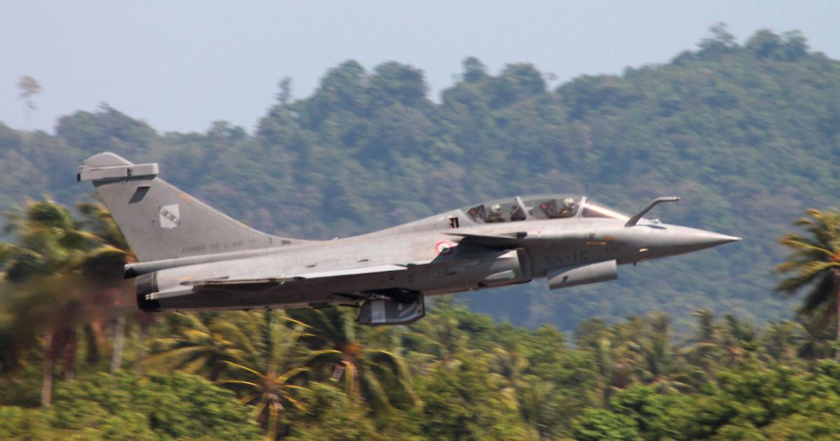 A French air force Rafale takes off to display at the Langkawi airshow in Malaysia last March, in support of a bid to sell the French jet there. (Photo: Chris Pocock)