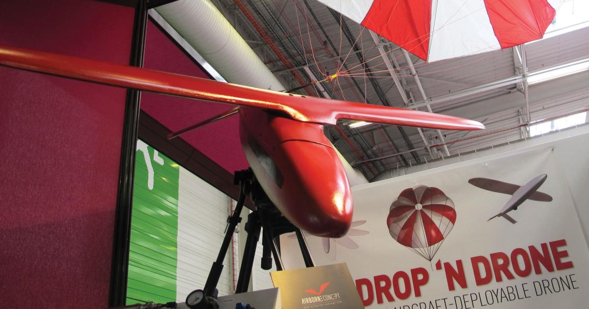 The wing of the electrically powered Drop ’n Drone rotates into position before the parachute detaches.